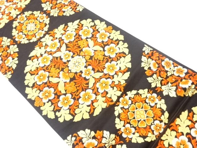 草花に華文模様織出し袋帯